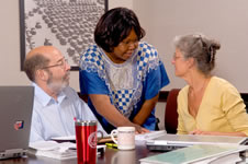 photo of a man and two women