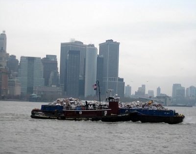 Barge filled with garbage.