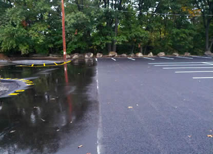 Traditional asphalt on left; porous asphalt on right