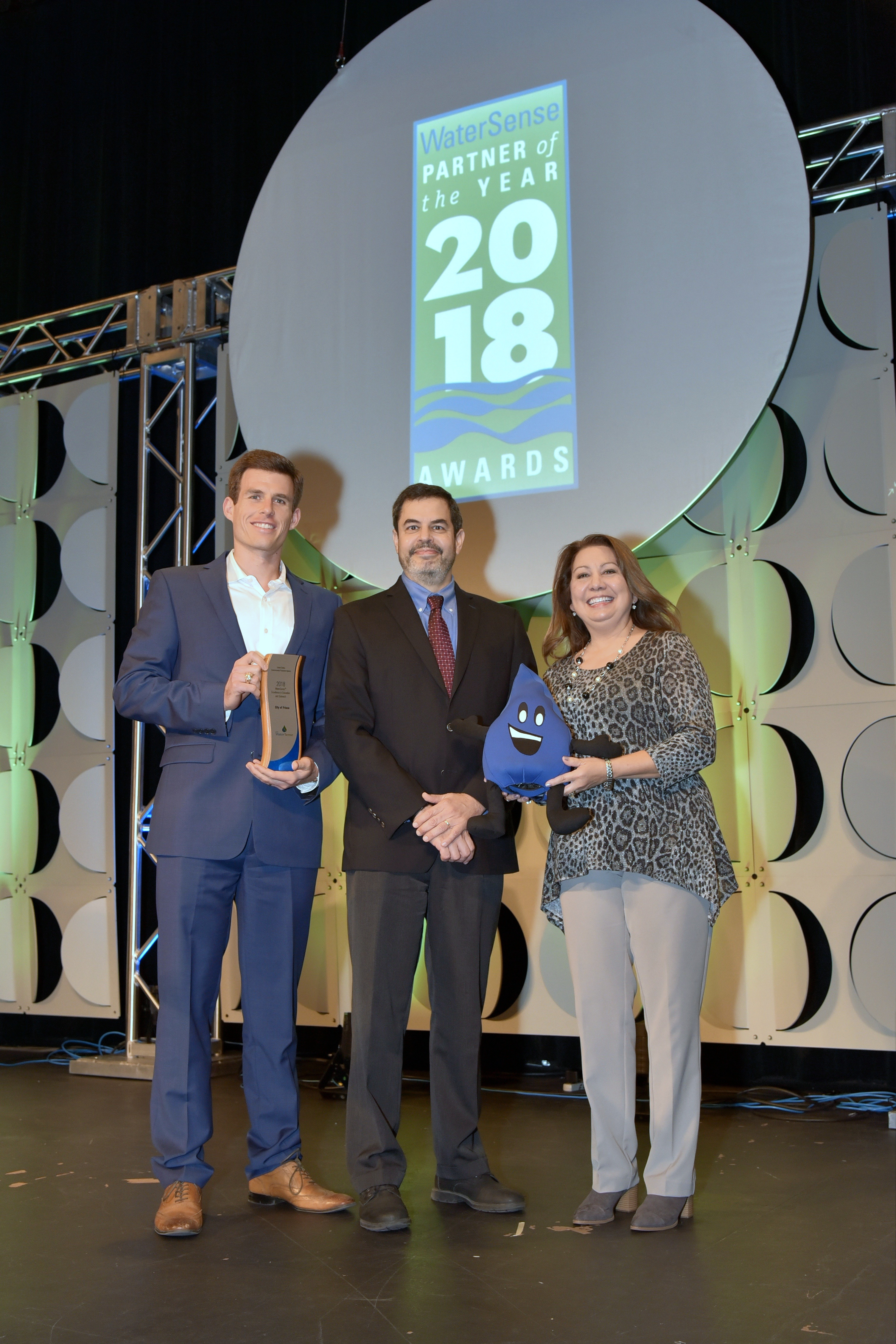 Excellence in Education and Outreach Award winner, City of Frisco, with U.S. EPA's Raffael Stein.