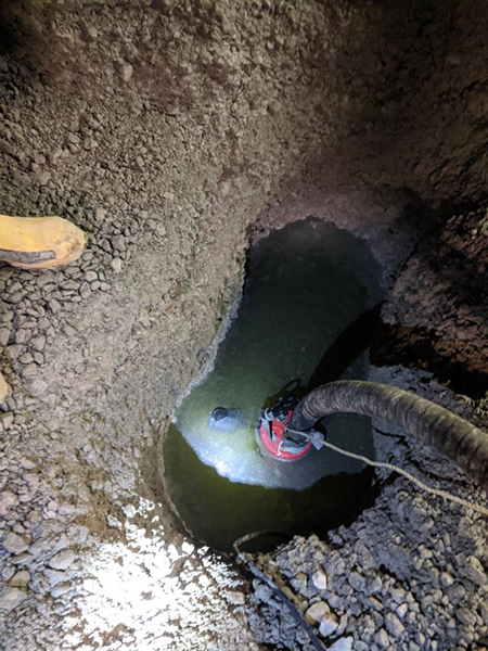 Pump in pit opened in basement