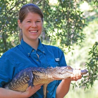 Jackie holding a gator