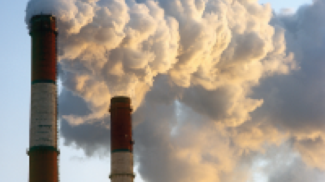 Photo: White smoke coming out of two smokestacks