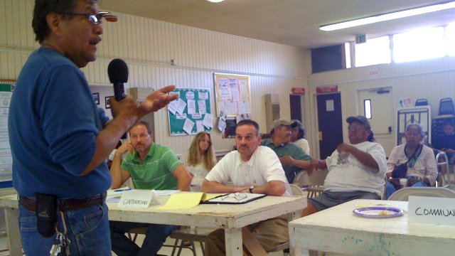Tribal meeting room with speaker talking to attendees