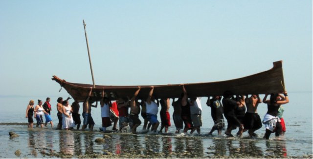 Coast Salish Canoe Journey 2009 landing in Pillar Point, WA. Photo courtesy of Carol Reiss/USGS.