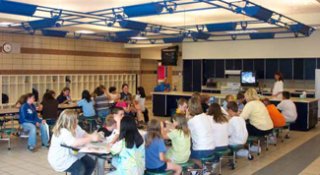 Schoolchildren at tables