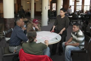 Providence residents and members of the Environmental Justice League of Rhode Island join together for the kick-off meeting of the CARE Alliance in March 2009.