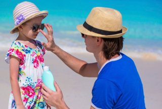 Image of UV Radiation and Sun Exposure Sunscreen Application