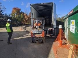 pallets of batteries to be recycled at battery and electronics inc