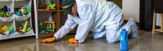 man cleaning floor