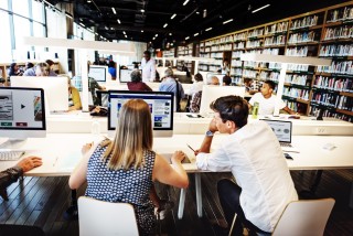 People working in a library