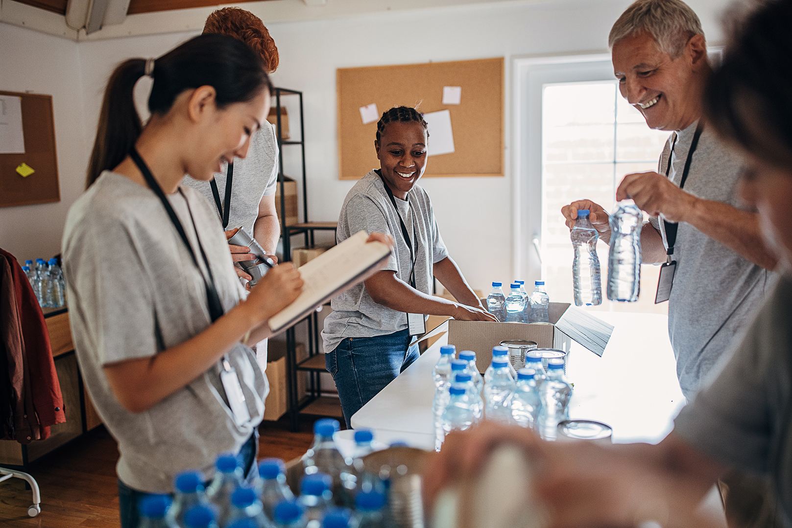 People at a heat aid center giving out supplies and water