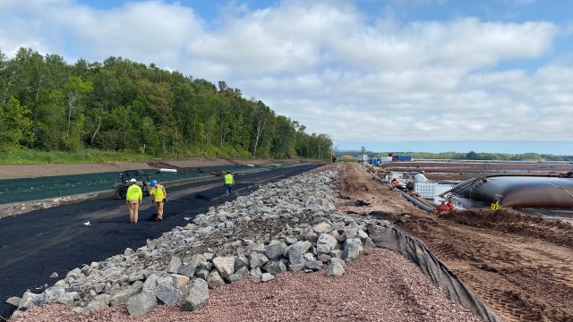 Installation of rip rap along the berm between the Upland confined disposal facility (CDF) and the downstream portion of the Unnamed Creek.