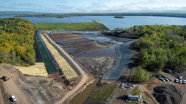 An aerial view of the downstream portion of the Unnamed Creek and the adjacent Upland confined disposal facility (CDF). Contractors continue to hydroseed the downstream portion of the Unnamed Creek.