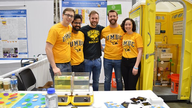 Five University of Maryland, Baltimore County students posing in front of their P3 project