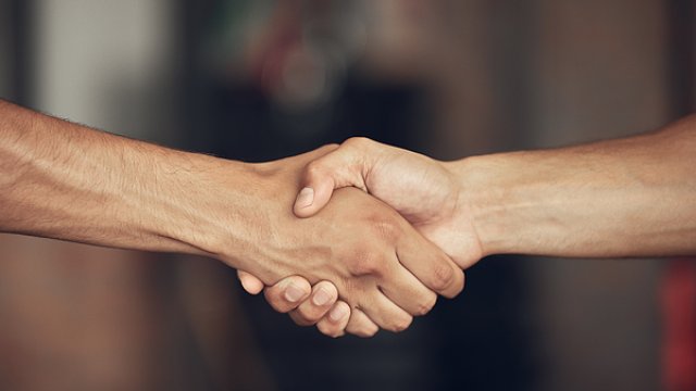 Two hands in a handshake