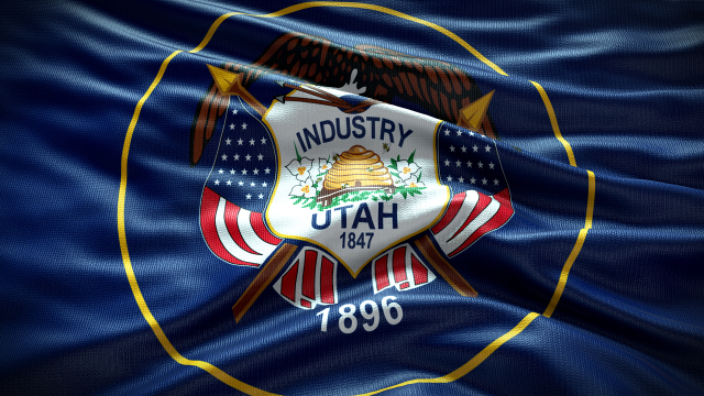 Utah state flag with ripples in the fabric. Adobe Stock image.