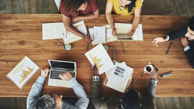 Stakeholders sitting around a table