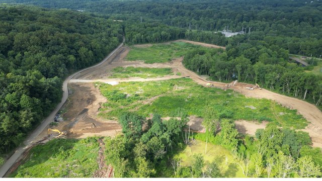View of the site looking south, contractor is clearing the site and beginning construction of the ditches and outfalls