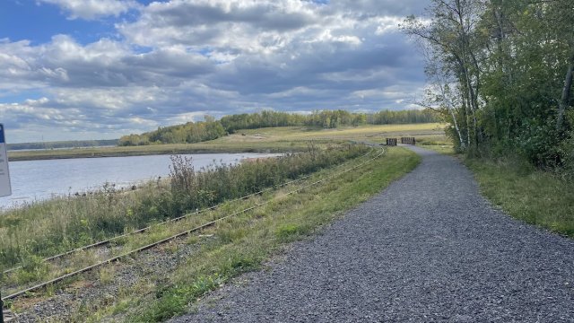 View south along the pedestrian trail adjacent to the shallow, sheltered bay. 
