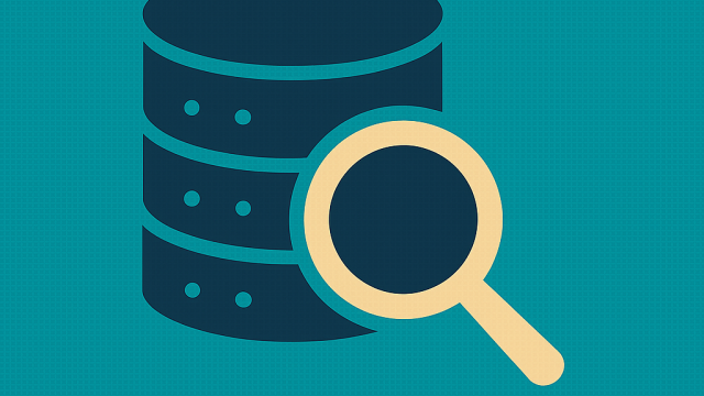 A magnifying glass searching over a stack of data