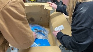 EPA CAA Inspectors inspecting a Shipment at a warehouse located along the North Dakota Canadian Border 