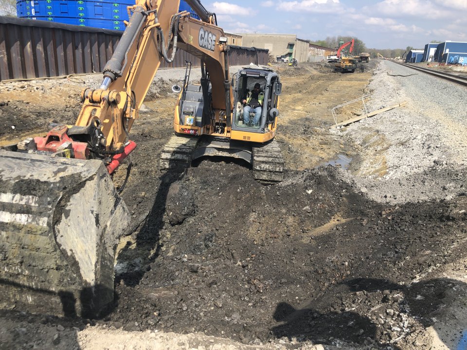 Excavator working along the north track