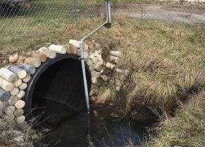 Smart sewer emptying into pond