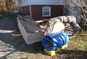 The conditions of the site before cleanup included illegal dumping and hazardous contamination (Photo Credit: Pawtucket Central Falls Development)