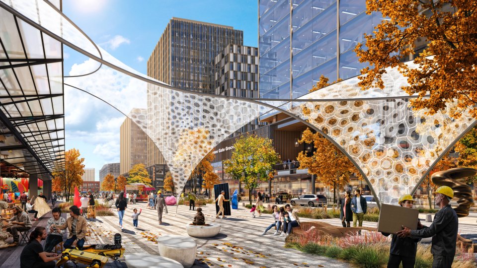 Renderings from Salt Lake City's Community Revitalization Agency's Rio Grande Plan. The rendering shows people and businesses under a planned neighborhood arch structure.
