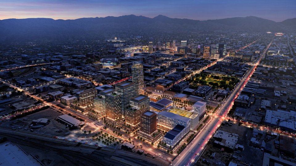 Renderings from Salt Lake City's Community Revitalization Agency's Rio Grande Plan. The rendering shows the Rio Grande Neighborhood at night from an aerial image.