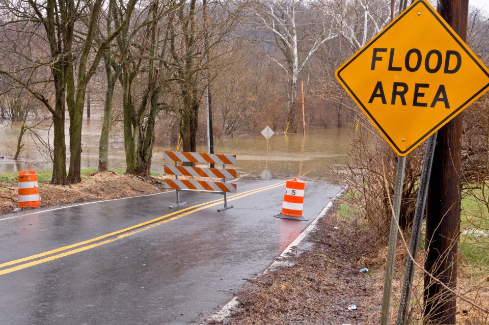 Flood waters covering roadway