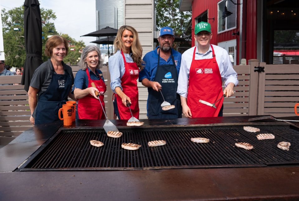 EPA Administrator Lee Zeldin, SBA Administrator Kelly Loeffler and U.S. Senator Joni Ernst serve as grill masters at the Iowa Pork Producers Association Tent.