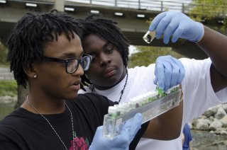 Students testing water quality