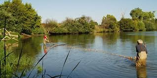 Two people fishing.