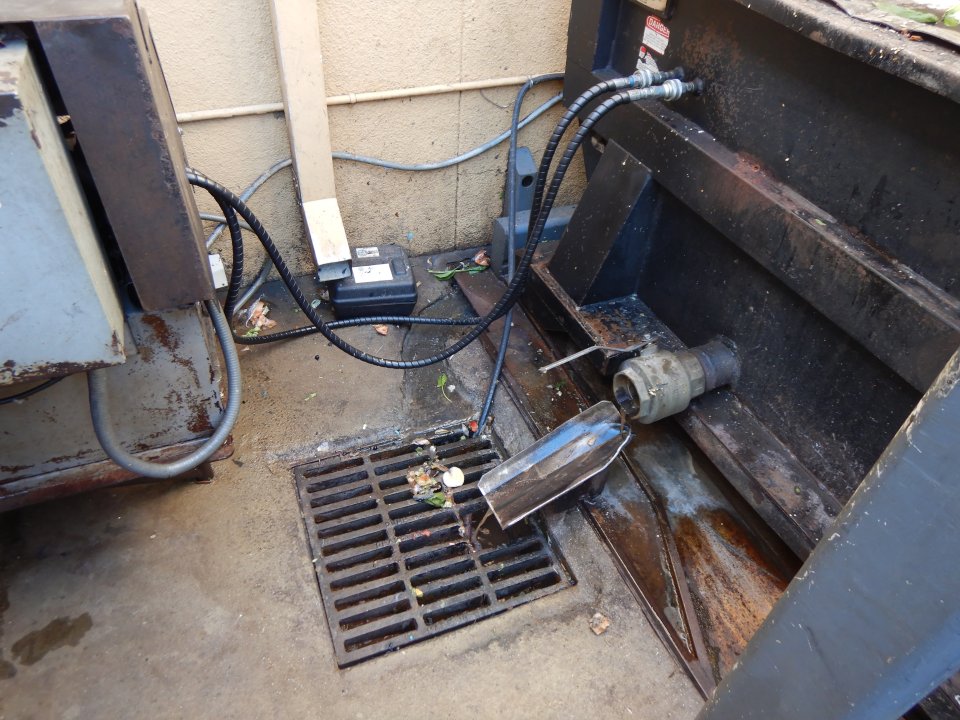 Drainage system at Gargiulo Produce discharging leachate from an on-site waste compactor. 