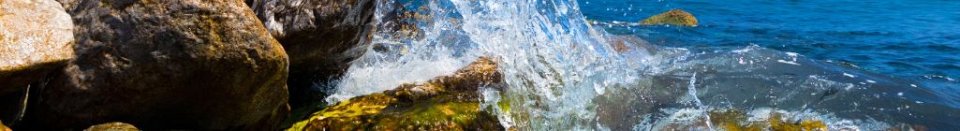 Water splashing against rocks