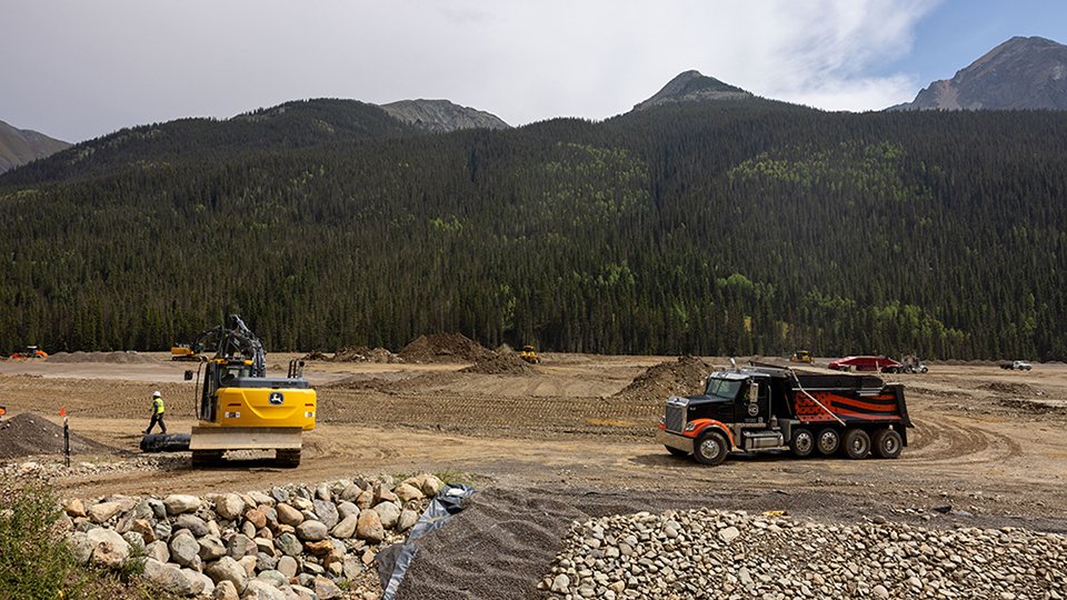 Bonita Peak Mining District large trucks and earth movers actively working on the site