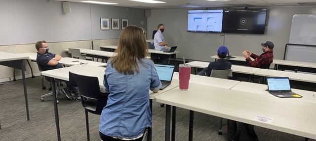 Group of people in a conference room during a meeting. 