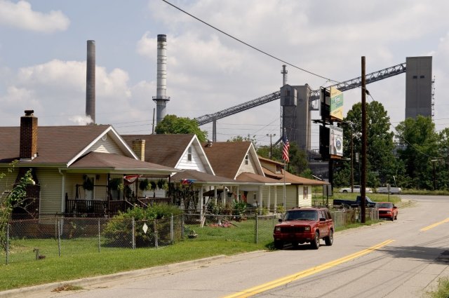 Homes with facility in background