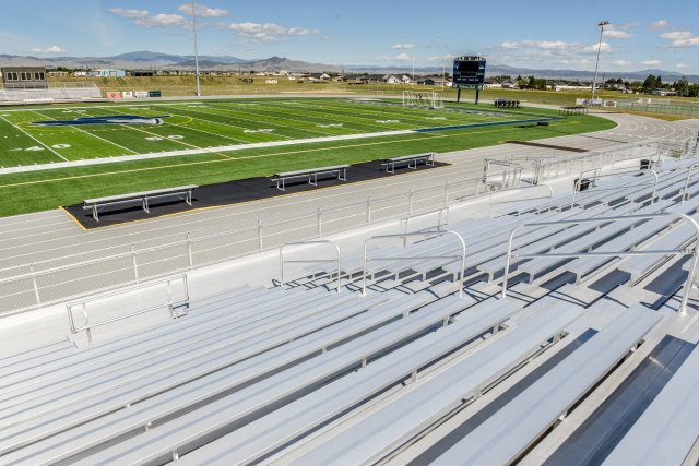 Bleachers next to a football field