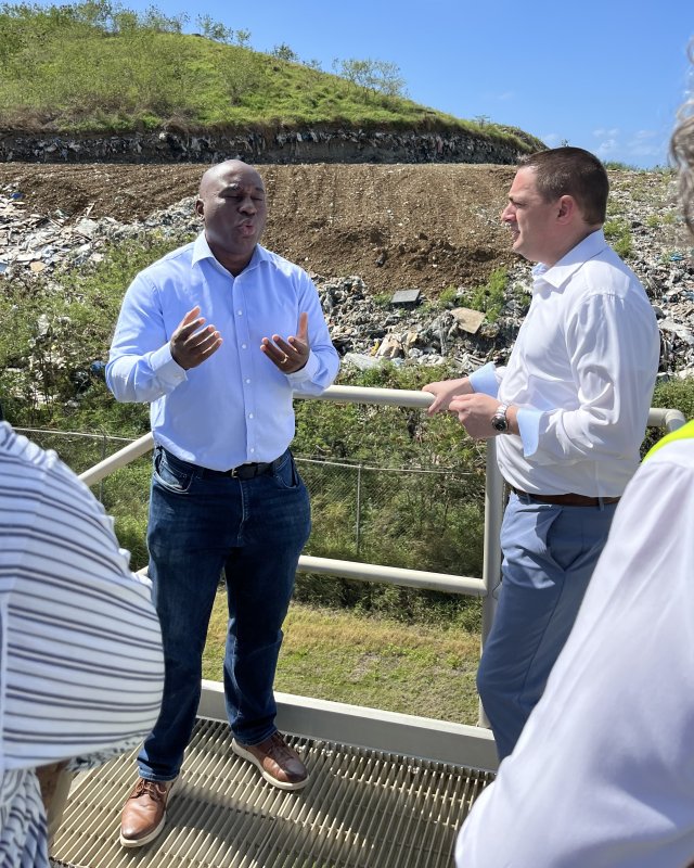 Virgin Islands Waste Management Authority Acting Director Daryl Griffith briefs Regional Administrator Michael Martucci at the Anguilla Landfill.