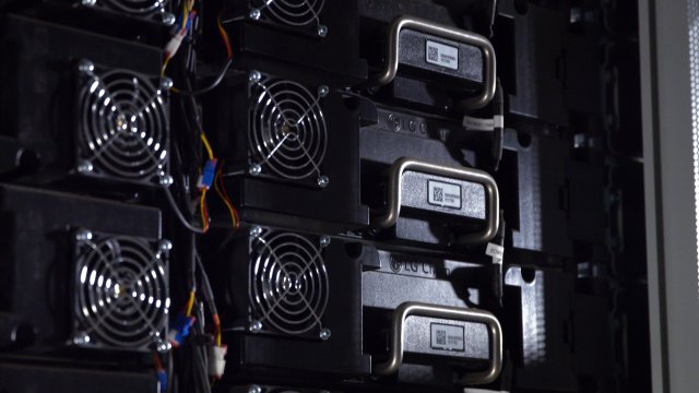 Close-up view of battery modules displaying wires that must be disconnected.