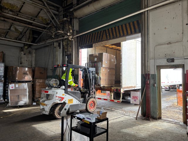 EPA contractors loading pallets.