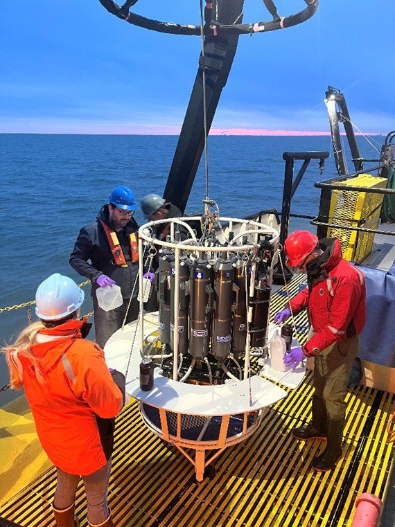 Scientists aboard R/V Lake Guardian collect water samples during the 2025 spring survey.