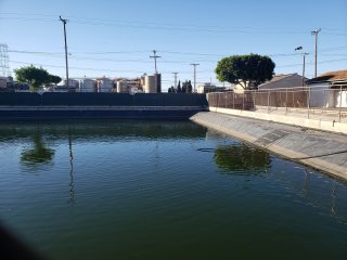 Rainwater collected in an area lined with impermeable material