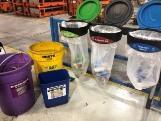 Photo of multiple recycling bins. 