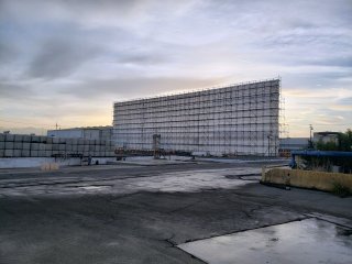 Site photograph showing final remaining wall of the full enclosure unit.