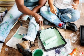 People painting on floor