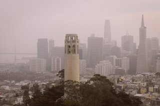 Image of wildfire smoke covering buildings